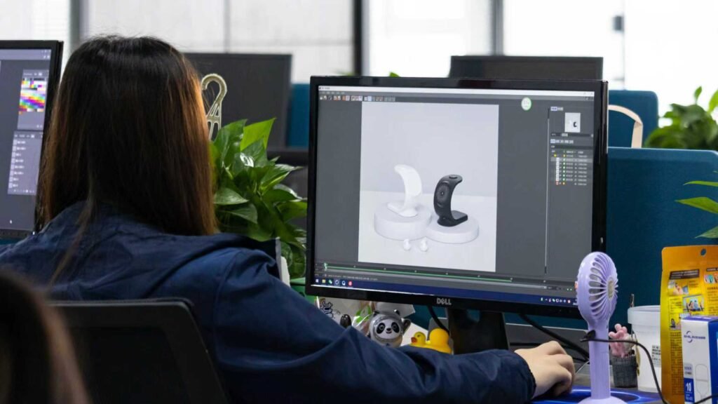 Graphic designer creating high-quality product renderings and custom packaging designs for wireless charger e-commerce brands.