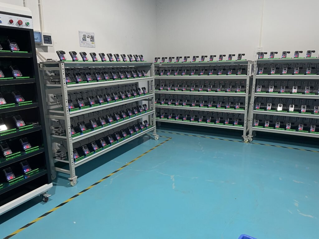 Wireless charger aging and reliability testing, including long-run charging cycles and temperature stress checks for stable mass production quality.